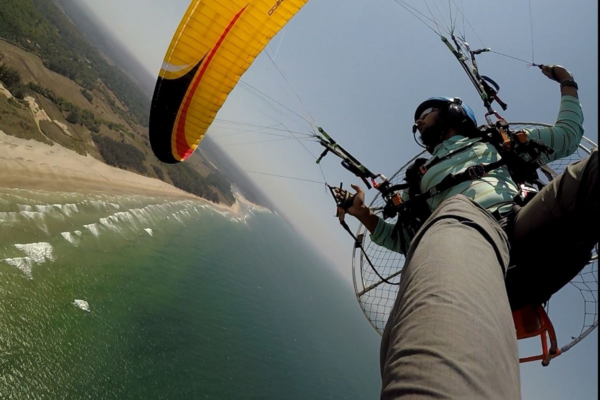 Tandem paramotoring flight over the Goa coastline near Arambol