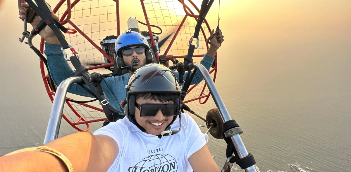 Wide coastal panorama during a Goa paramotor flight